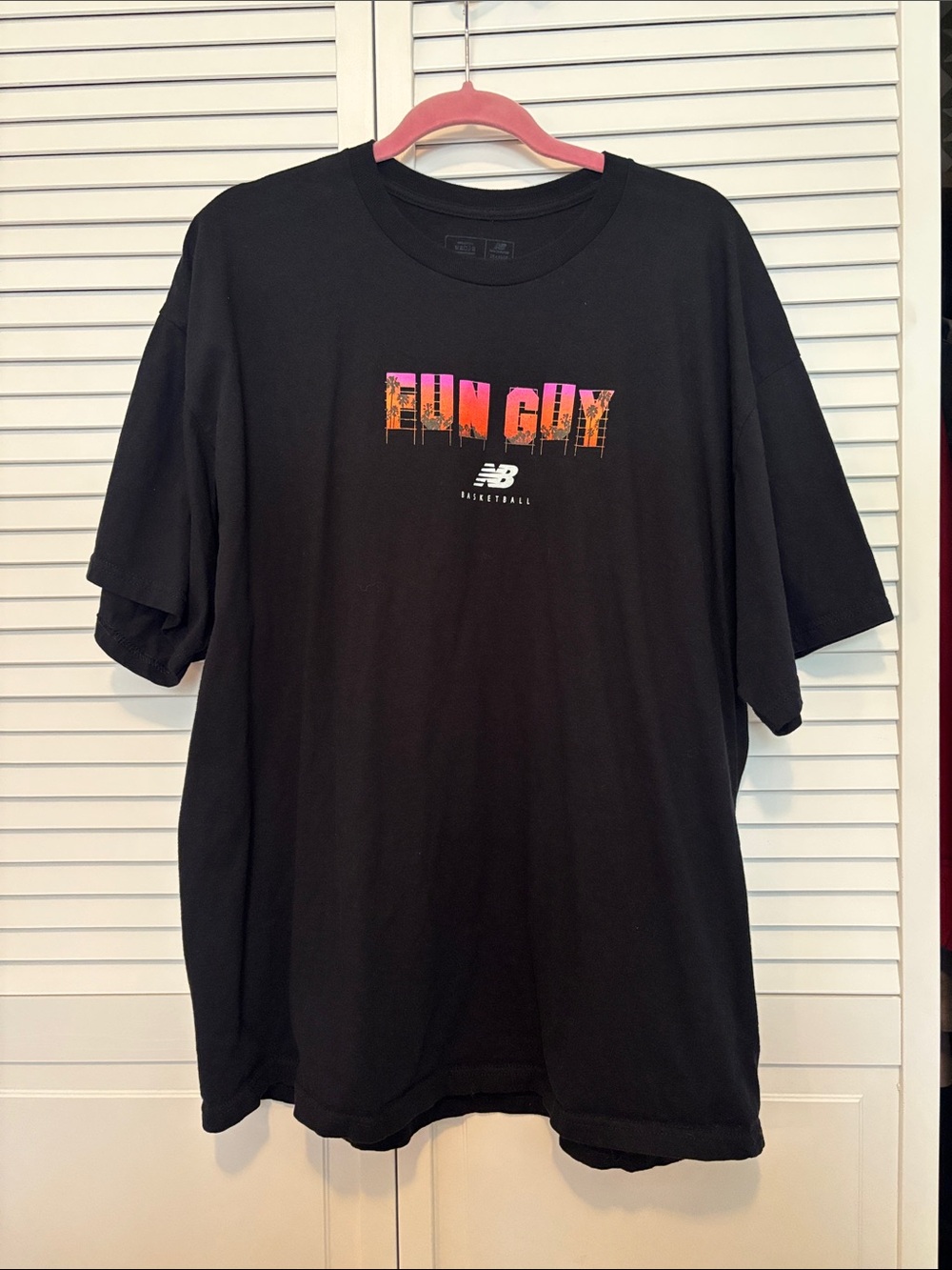 New Balance Black Short-Sleeve Graphic Tee with Pink and Orange Print